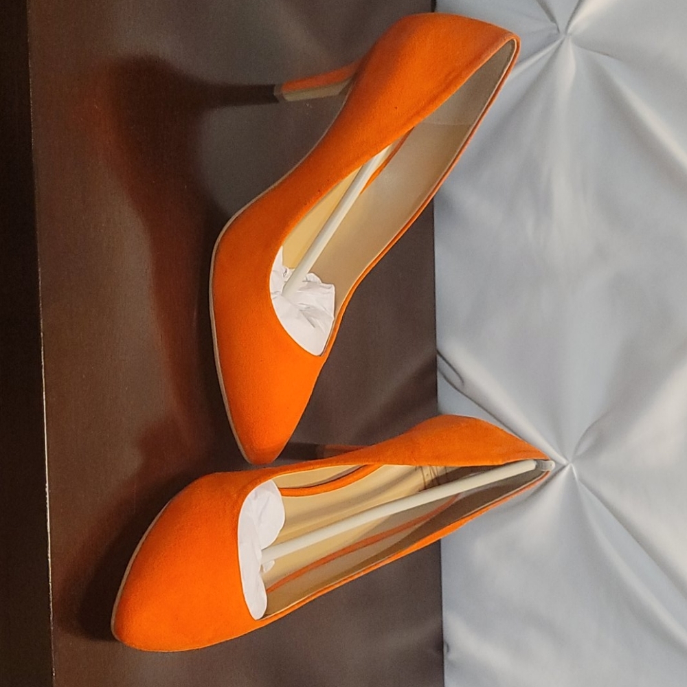 Cute orange heels gently worn